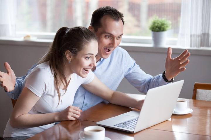 couple taking an overview of their house in Leeds
