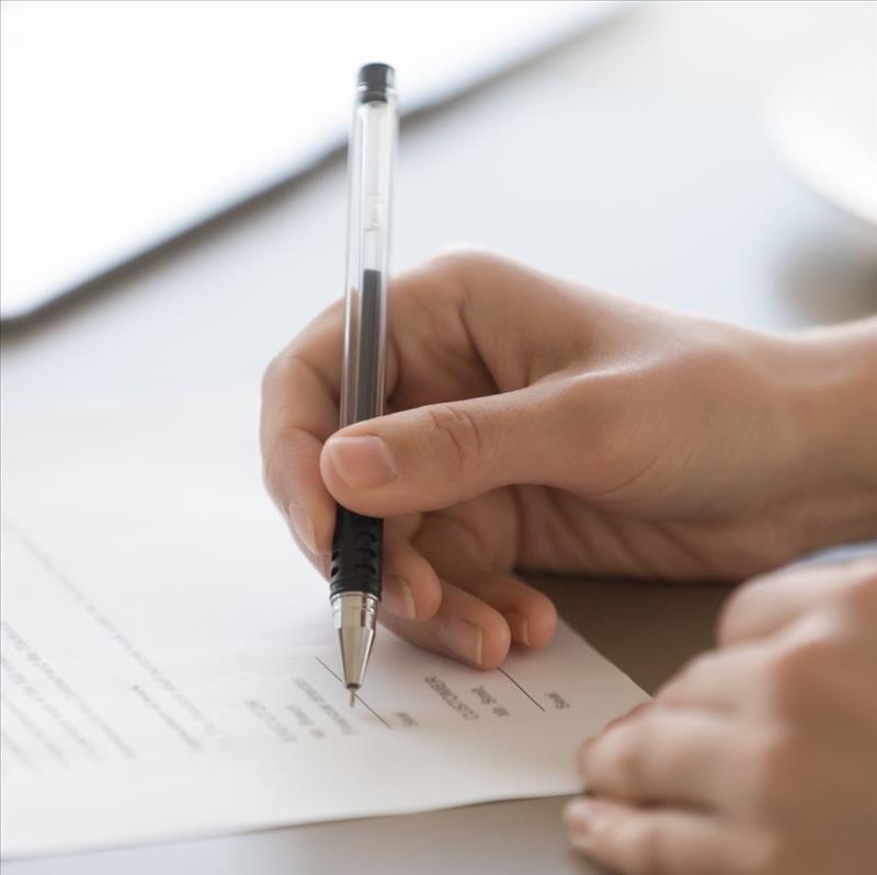 Leeds agents checkign the agreement