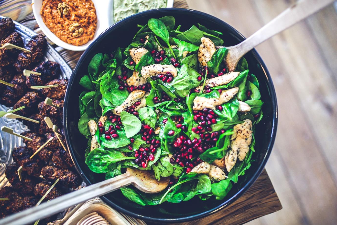 A bowl of salad
Description automatically generated